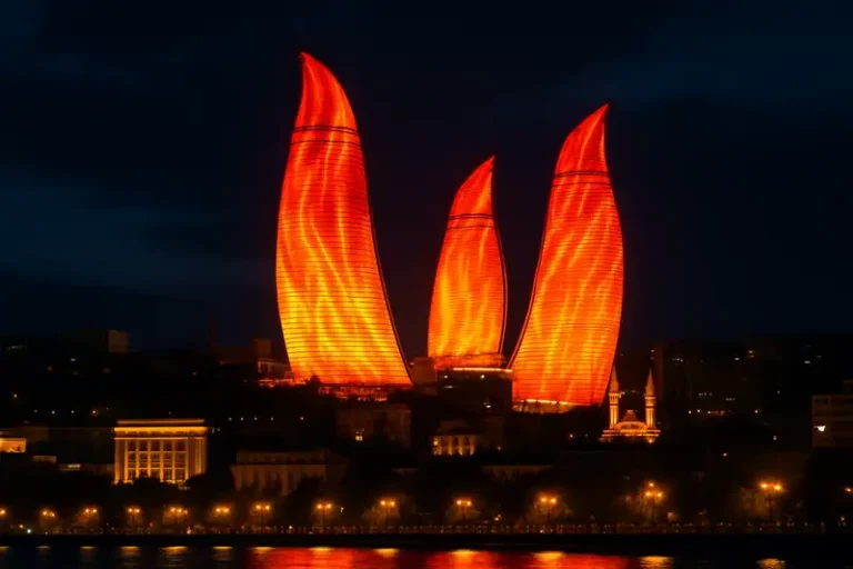Baku 1 The three, giant, curved skyscrapers known as the Flame Towers are lit up at night with a dynamic LED display that makes them look like enormous, flickering orange flames.