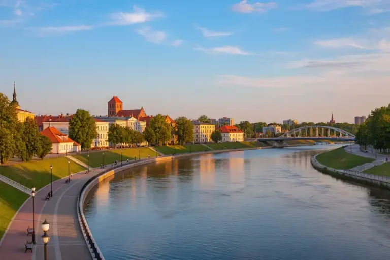 Gorzow Wielkopolski 3 Gorzow Wielkopolski skyline with Warta riverfront at sunset.