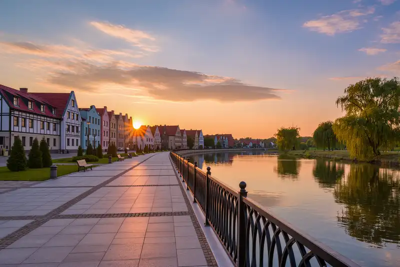 Slupsk riverside promenade with historic townhouses