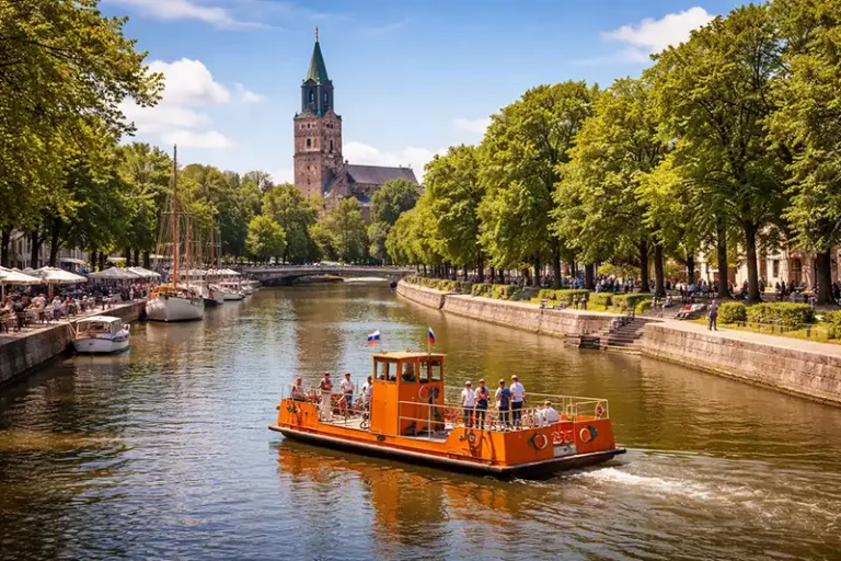 Turku 42 The Aura River in Turku, Finland, with the Cathedral and Föri ferry.