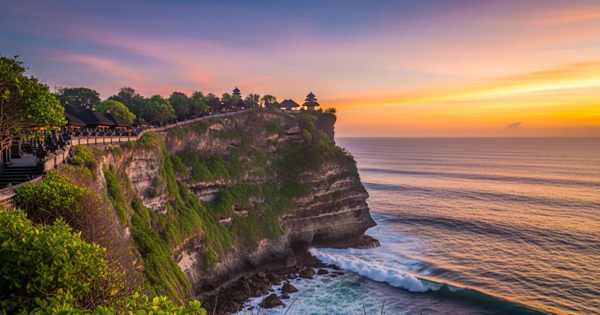 Uluwatu Temple at sunset with dramatic cliffs and ocean views