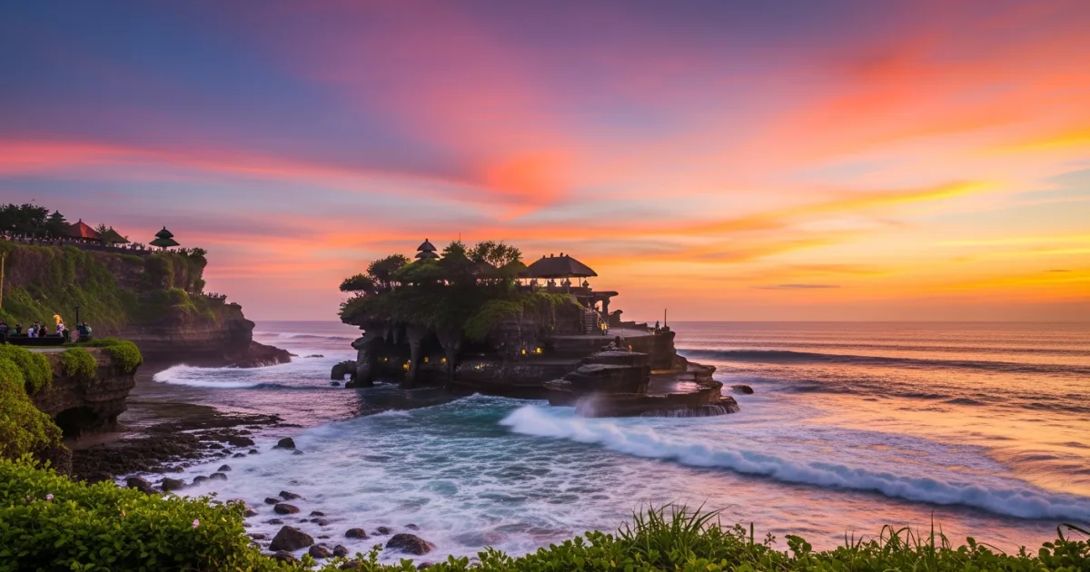 Tanah Lot Temple perched on a rock formation during a beautiful sunset in Bali