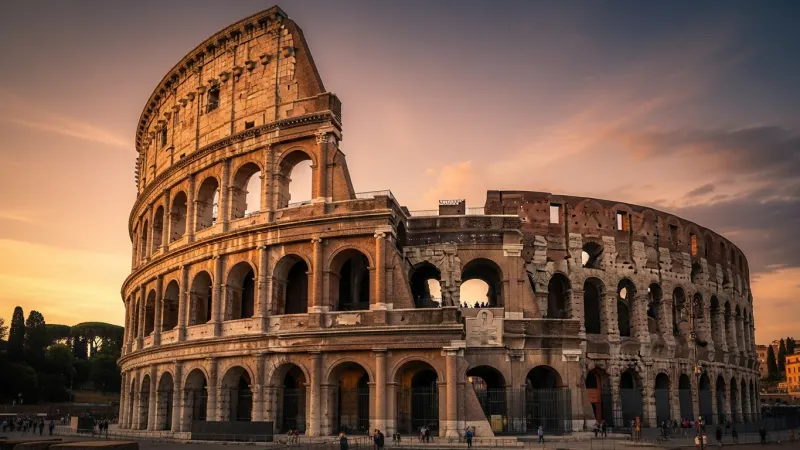 Early Bird or Twilight Explorer 5 The exterior of the Colosseum at sunset, glowing in warm light, with very few people around, emphasizing a peaceful atmosphere.
