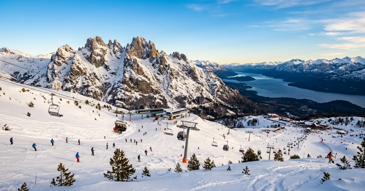 Panoramic view of Cerro Catedral ski resort with snow-covered peaks and Nahuel Huapi Lake in the background