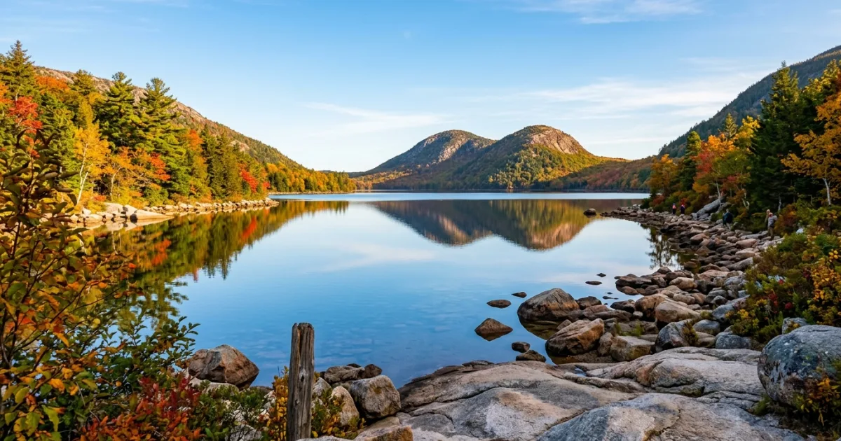 Scenic wide-angle view of Jordan Pond and the Bubbles mountains in Acadia National Park