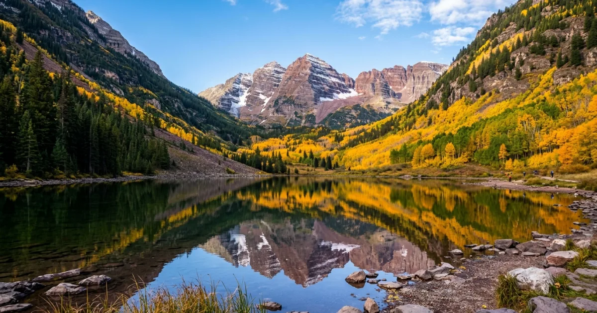 Maroon Bells mountains reflected in Maroon Lake during autumn