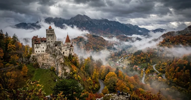 Romania 16 Bran Castle surrounded by autumn forests in Transylvania, Romania