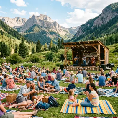 People enjoying live music at an outdoor stage in Canmore with Rocky Mountain peaks behind them