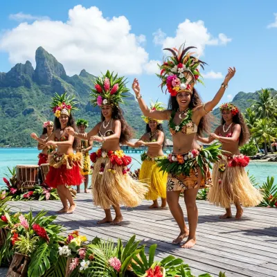 Tahitian dancers in elaborate natural plant costumes and floral headpieces performing at Heiva i Tahiti.