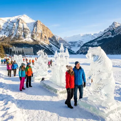 Detailed ice sculpture glistening in the winter sun against the snowy mountains of Lake Louise.