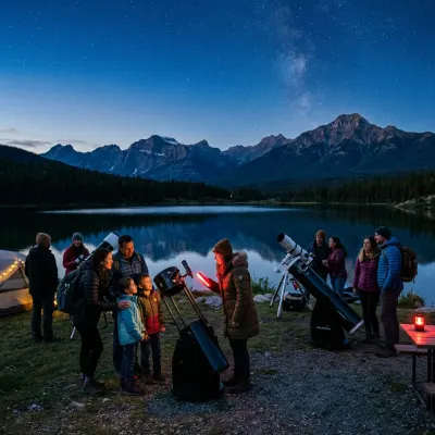 Stargazers looking through telescopes beside a calm mountain lake during twilight in Jasper.