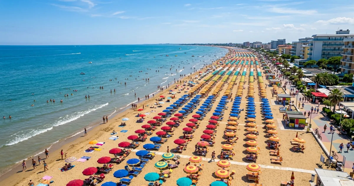 Colorful umbrellas and sunbeds lining the golden sands of Jesolo Beach, Italy