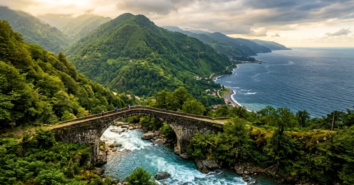 Panoramic landscape of Adjara Region featuring green mountains, the Black Sea coastline, and lush forests in Georgia