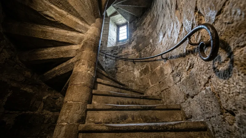 Navigate Steep Medieval Stairs and Sensitive Themes