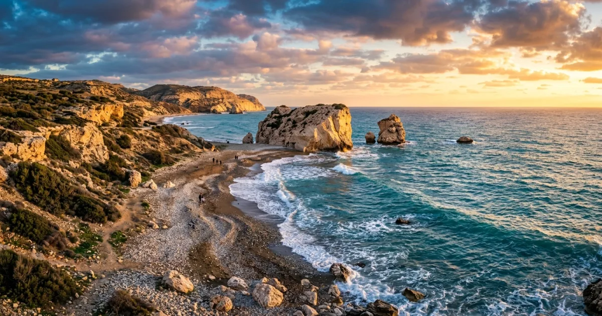 Panoramic sunset view over Petra tou Romiou sea stack on the Paphos coastline in Cyprus