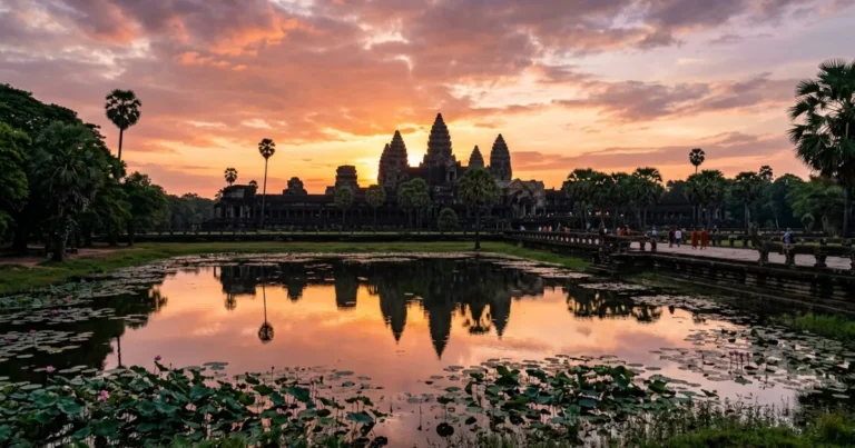 Siem Reap 7 Panoramic sunrise view over the iconic towers of Angkor Wat reflecting in a lotus pond in Siem Reap