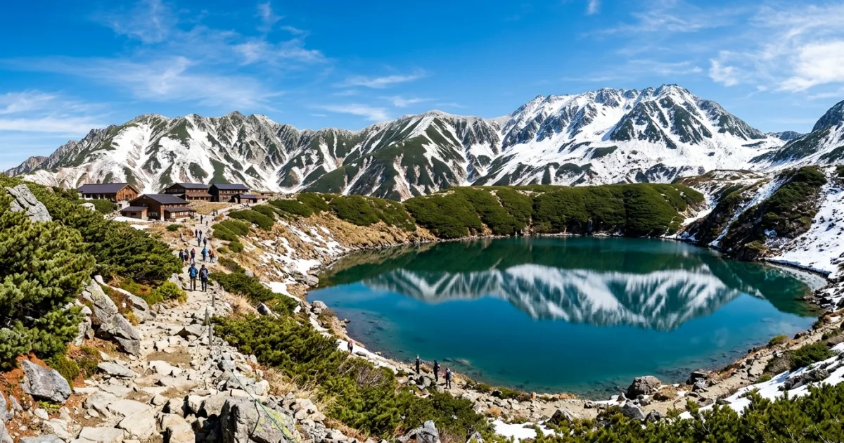 Panoramic landscape of Mount Tateyama and the Northern Japan Alps reflecting in Mikurigaike Pond in Toyama Prefecture